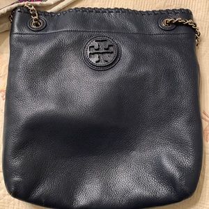 Versatile, Tory Burch navy blue handbag.